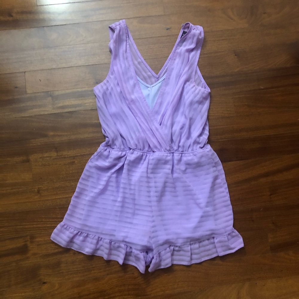 Light purple romper.